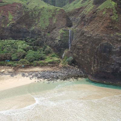 View of beach and waterfall