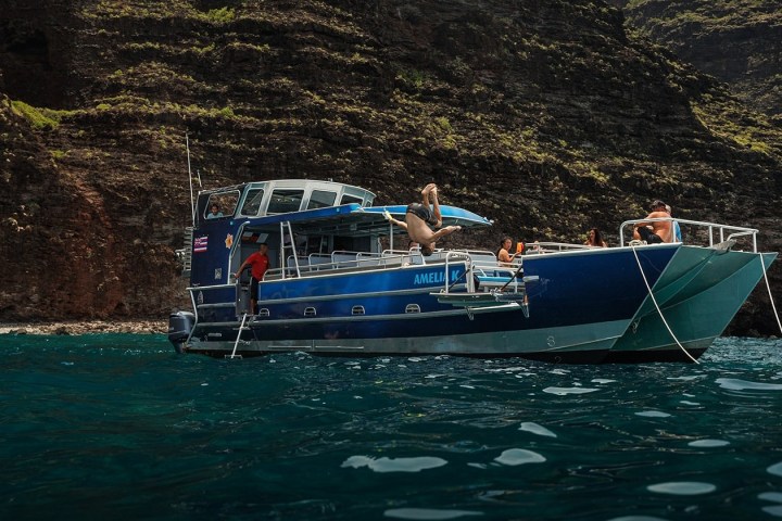 a small boat in a body of water