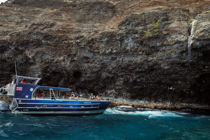 a small boat in a body of water