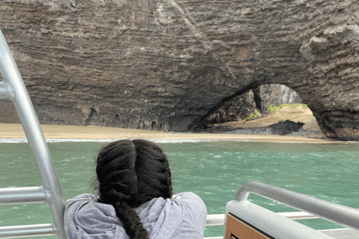 a person standing in front of a body of water