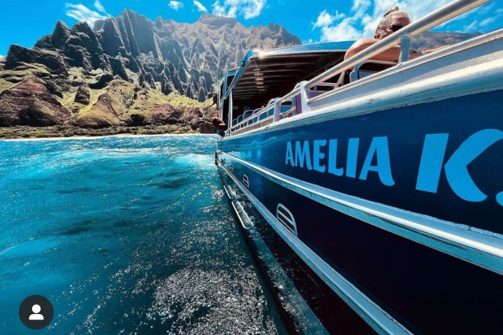 a boat sitting on top of a mountain
